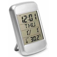 Weather station indicating time, day, date and temperature